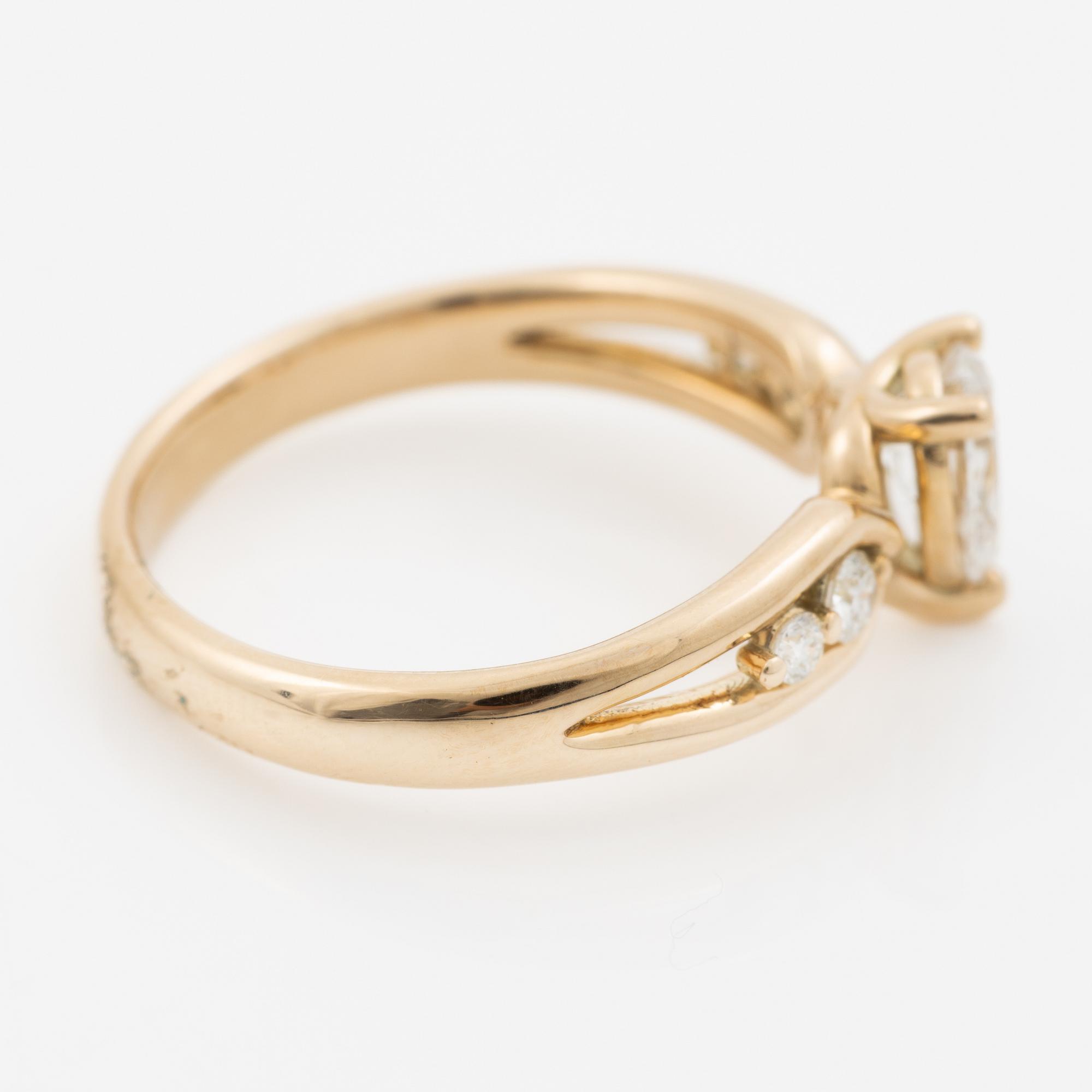 Ring 14K guld med droppslipad diamant, medföljande IGI report.
