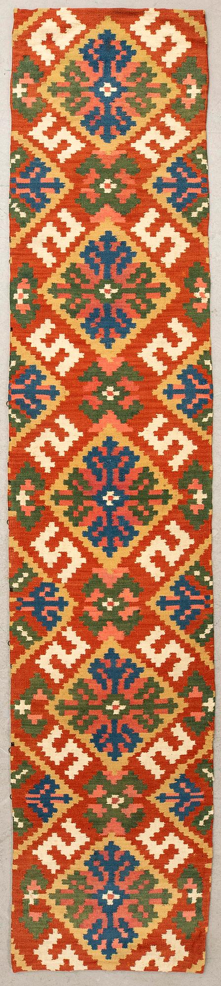 A bench cushion, flat weave, probably Västergötland, approx. 240 x 47 cm, first half of the 19th century.