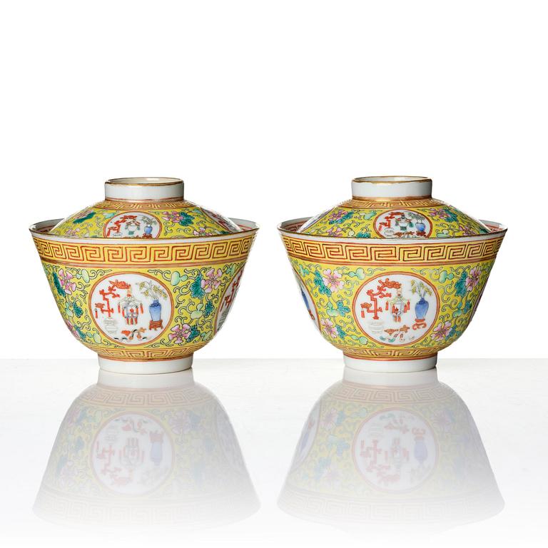A pair of yellow ground 'medallion' bowls with covers, Qing dynasty with Daoguang mark.