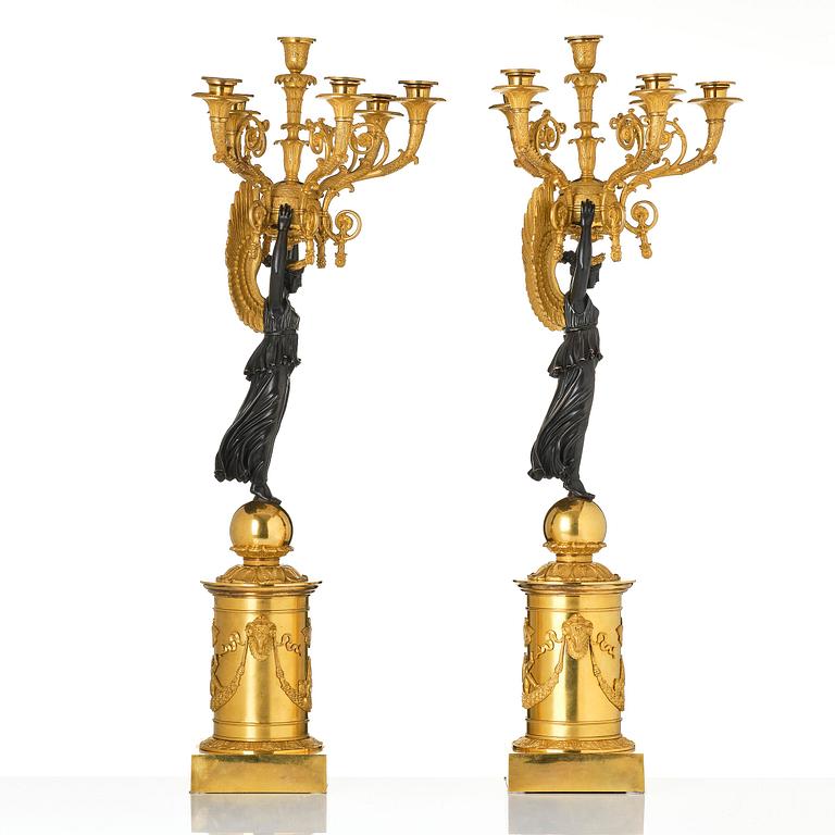 A pair of important six light Empire candelabra.