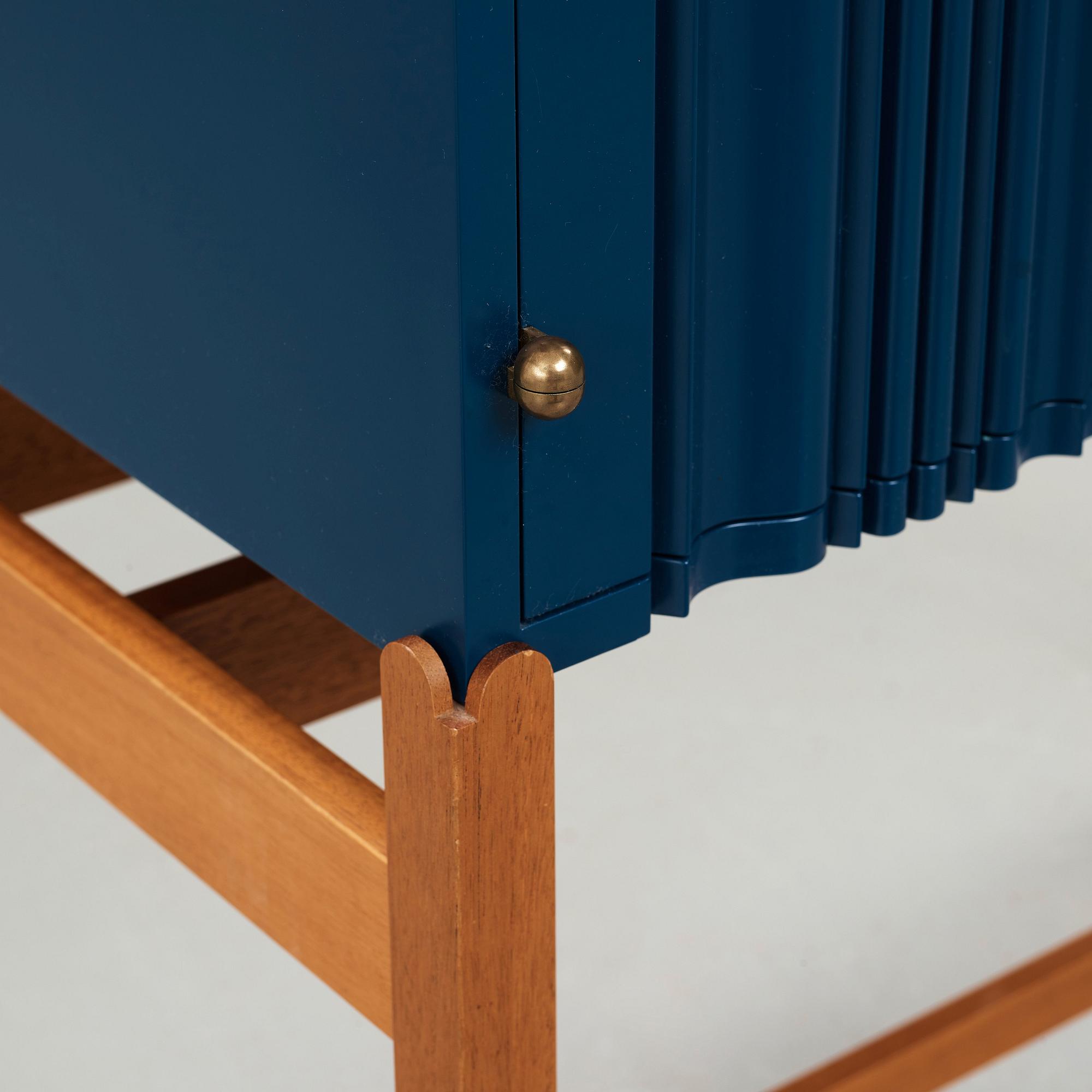 Josef Frank, a blue lacquered cabinet on stand, model nr 2192, by Svenskt Tenn, Sweden.