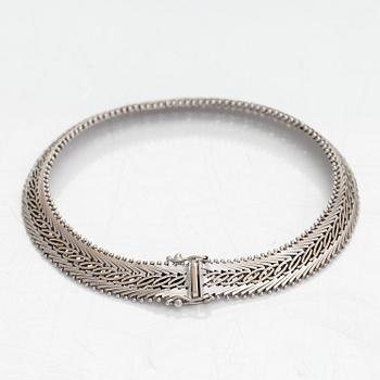 A 14K whitegold bracelet, Finnish importmarks Turun Kultaseppä Oy 1974.