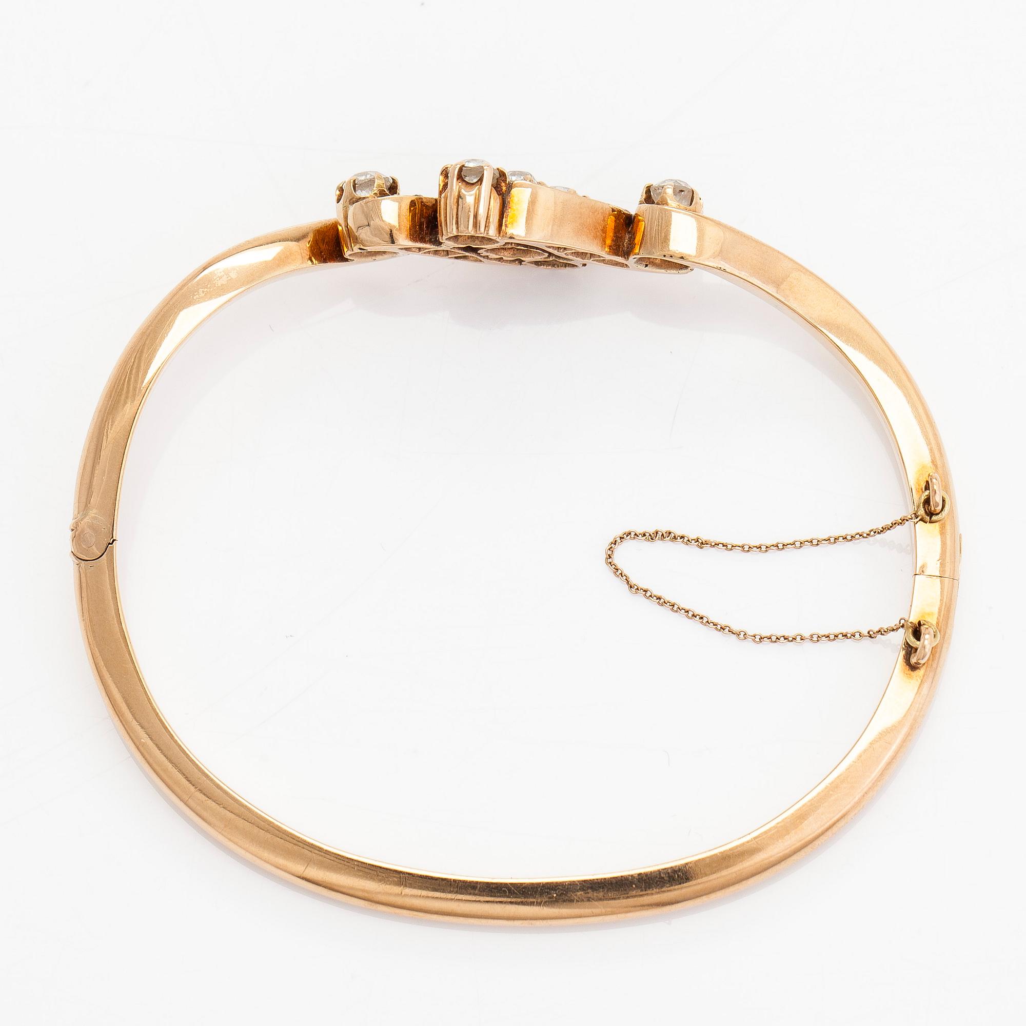 A 14K gold bangle, set with old-cut diamonds, St. Petersburg 1882-1898.