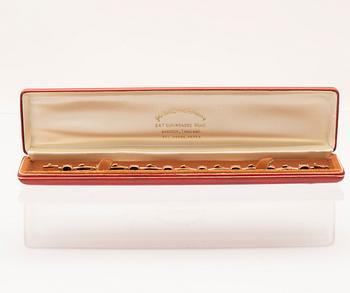Armband 14K guld med svarta cabochonslipade stjärnsafirer.