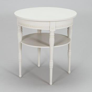 A Gustavian style small round table from first half of the 20th century.