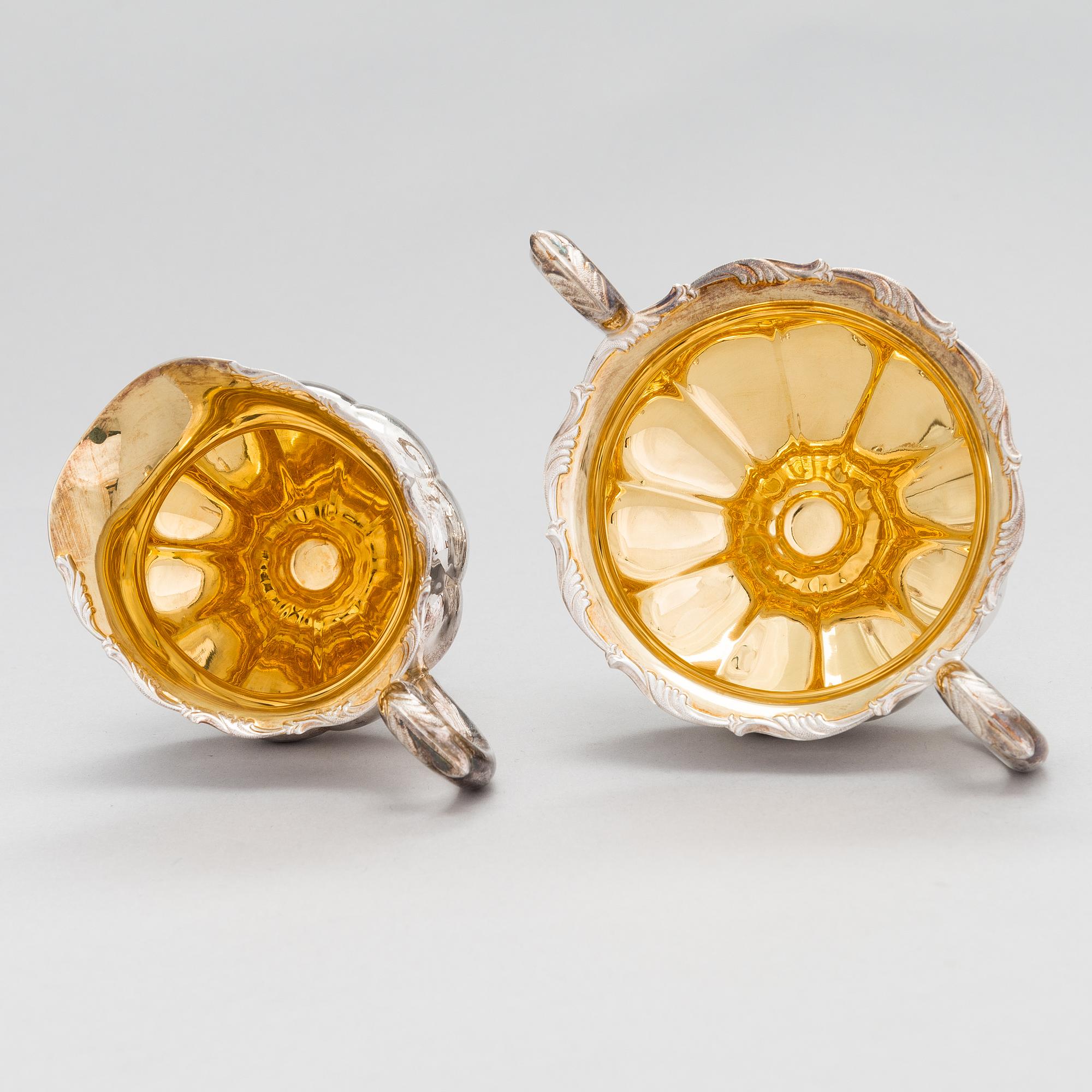 A silver coffee pot, a parcel-gilt sugar bowl and cream jug, Turku Finland 1946 and 1985.