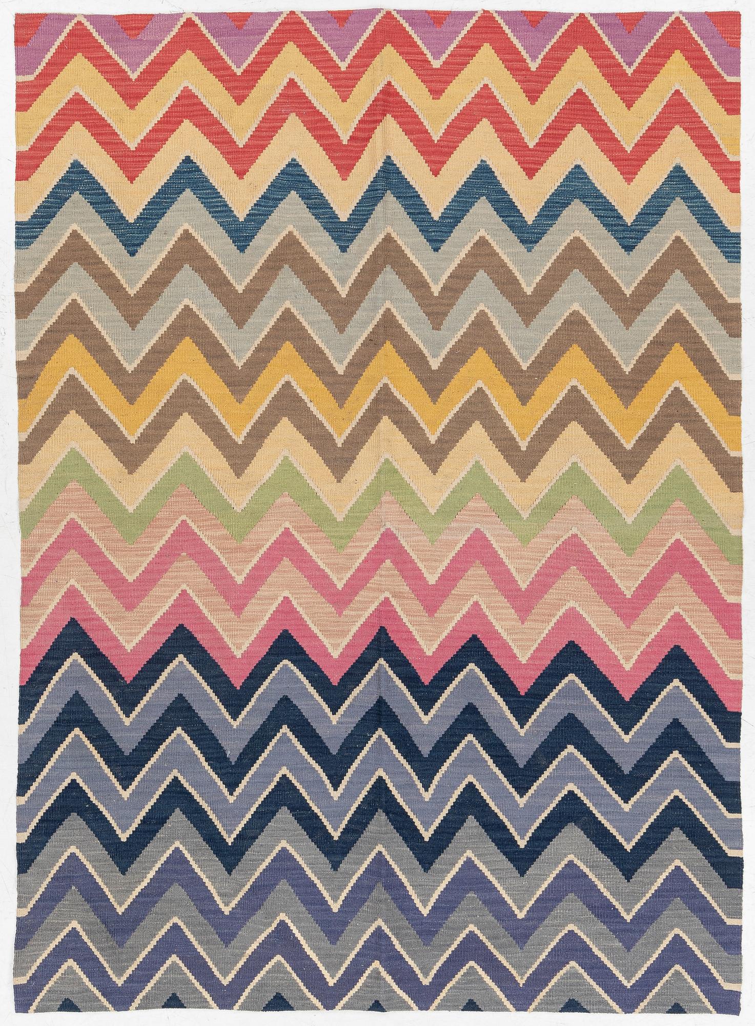 A flat-woven rug, c. 240 x 170 cm.