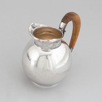 A sterling silver pitcher, Helsinki, Finland 1963.