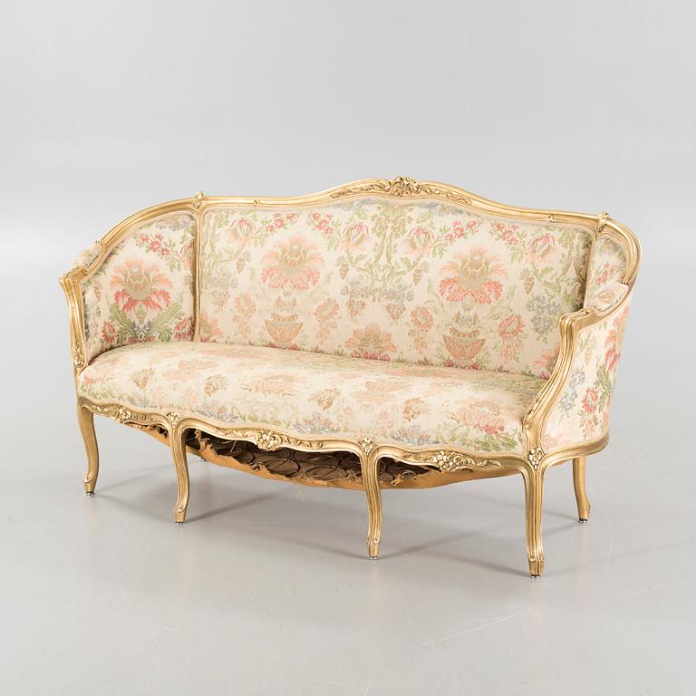 A rococo style sofa from the first half of the 20th century.