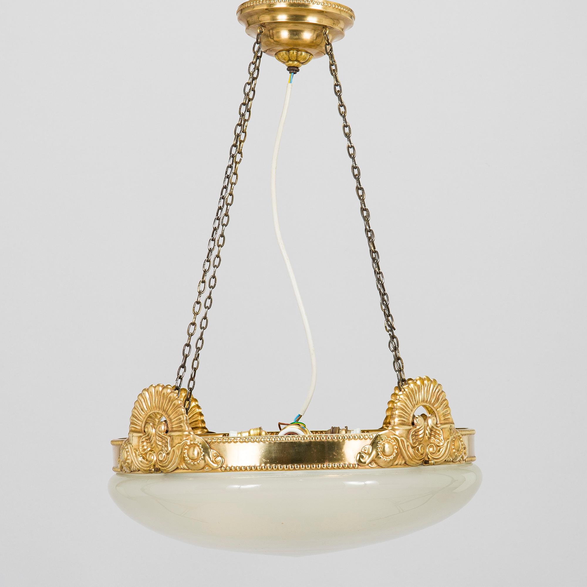 Kattovalaisin, 1900-luvun alku.