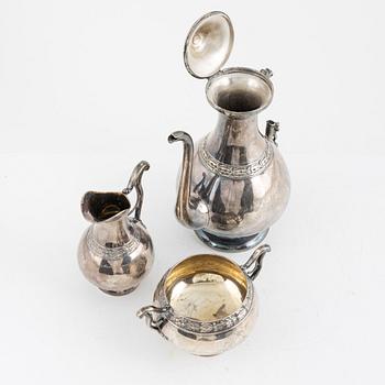 A Swedish Silver Coffee Pot, Creamer and Sugar Bowl, marks of GAB, Stockholm 1875-1897, and GT Folcker 1875.