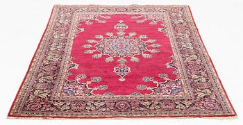 An oriental rug, c. 205 x 133 cm.