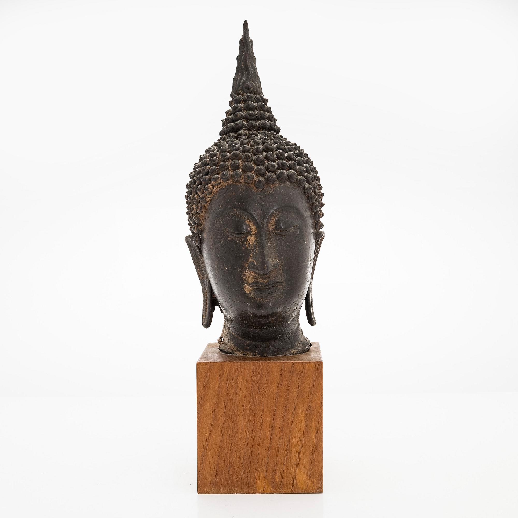 A patinated metal sculpture from Thailand, 20th century.