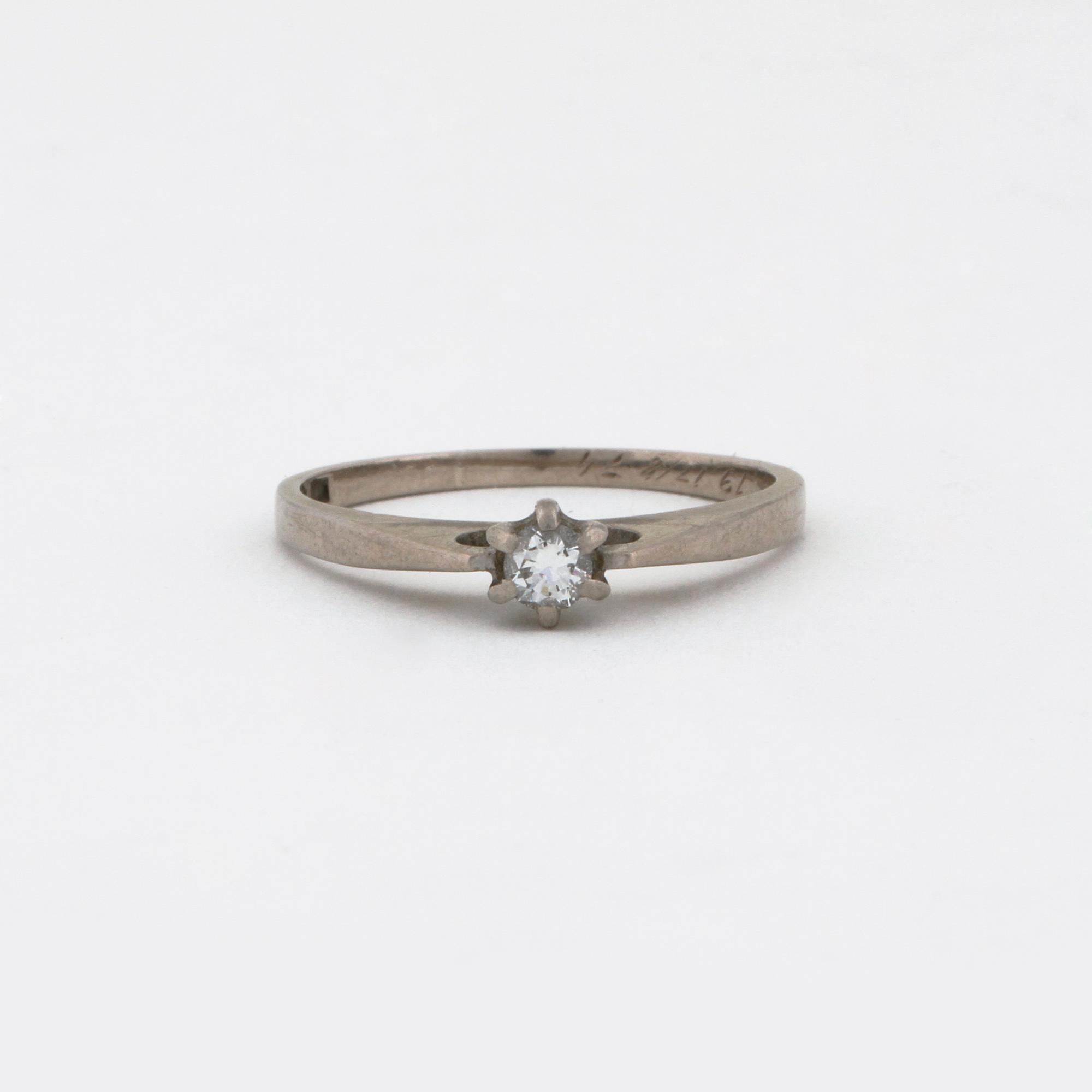A brilliant cut diamond ring.