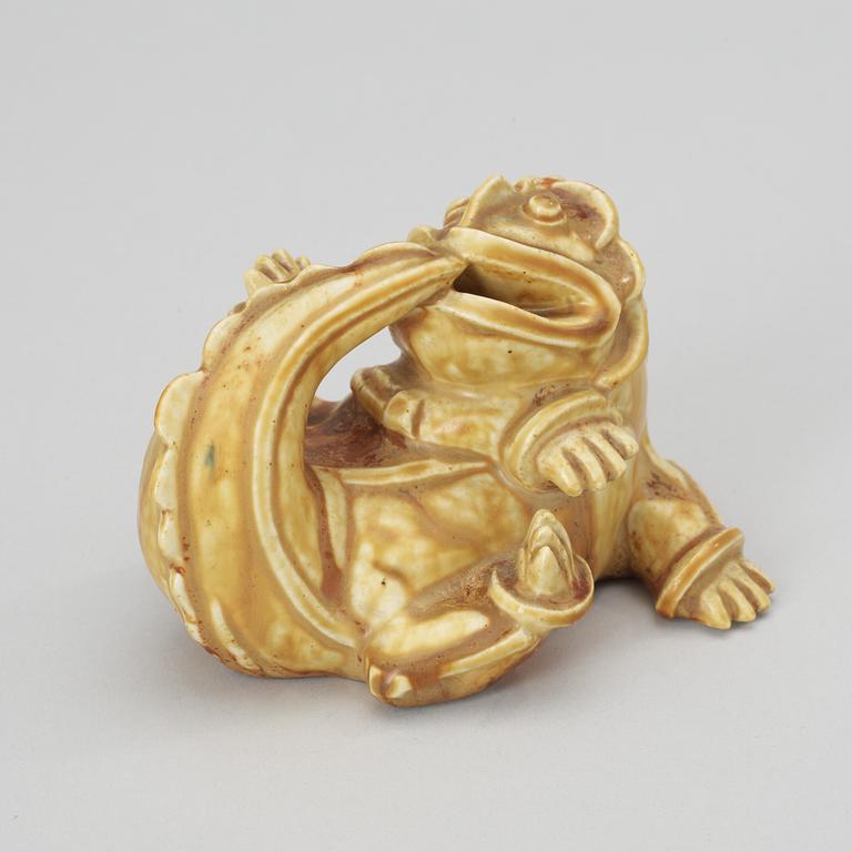 A Wihelm Kåge stoneware dragon's puppy by Gustavsberg, 1940's.