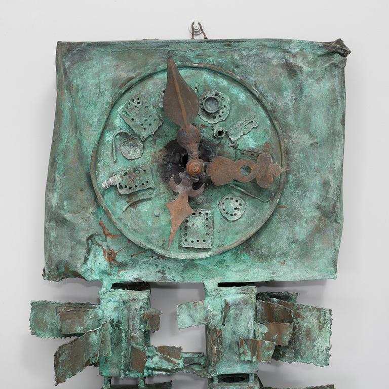 a patinated metal sculpture,