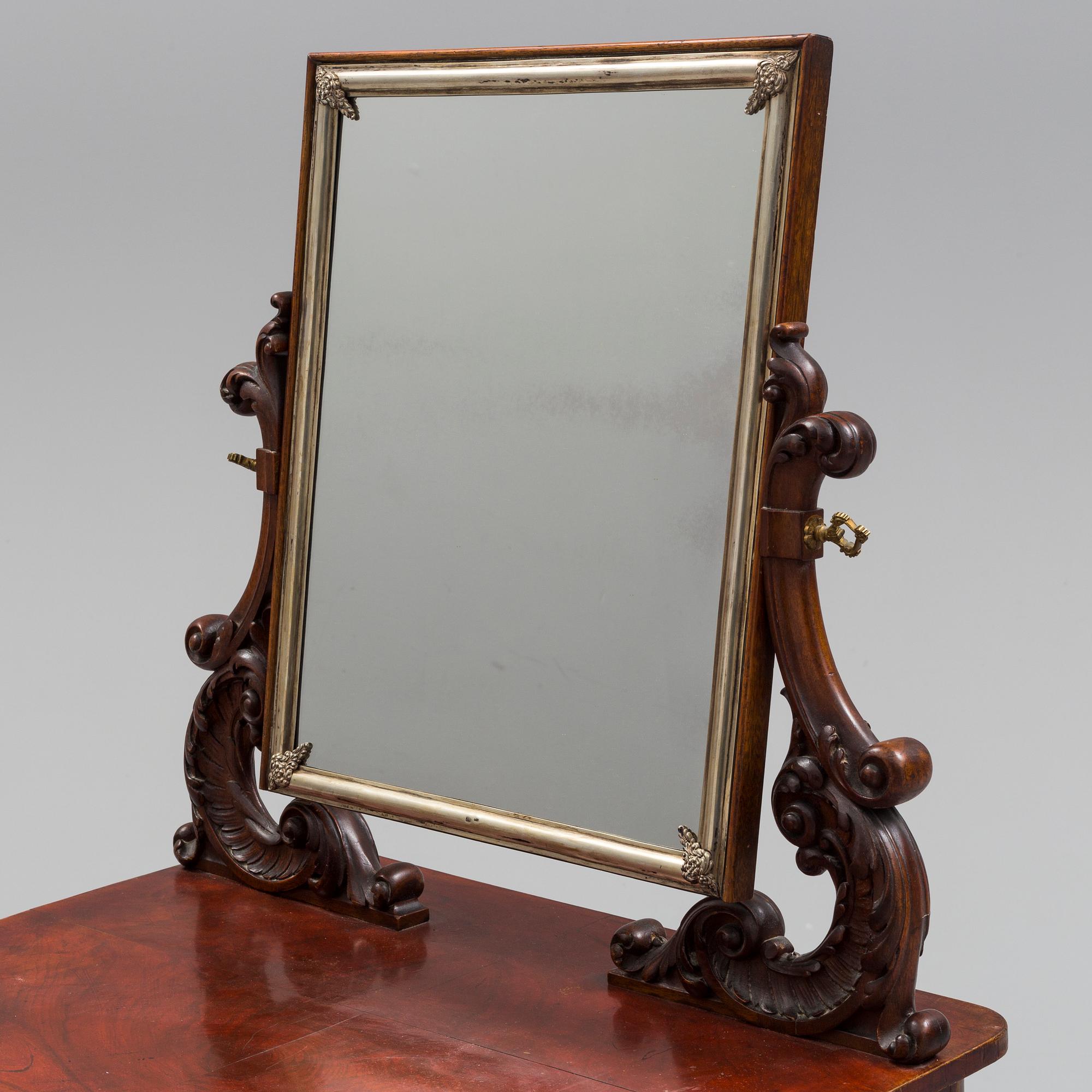 A mid 19th century late empire dressing table.