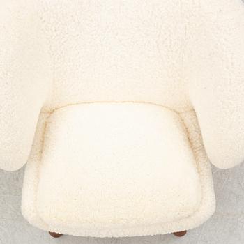 Finn Juhl, a' Pelican Chair' armchair, House of Finn Juhl, Denmark.
