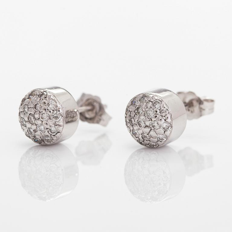 A pair of 14K whitegold earrings, with diamonds totalling approximately 0.36 ct.