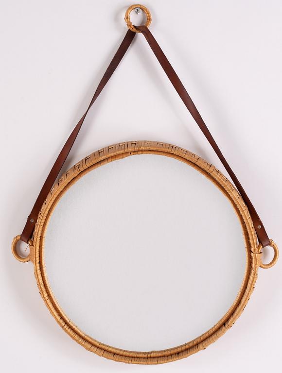 A rattan mirror.