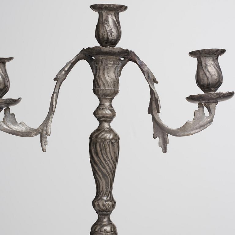 A pair of Swedish Rococo pewter three-light candelabra by Anders Wetterquist, Stockholm 1774.