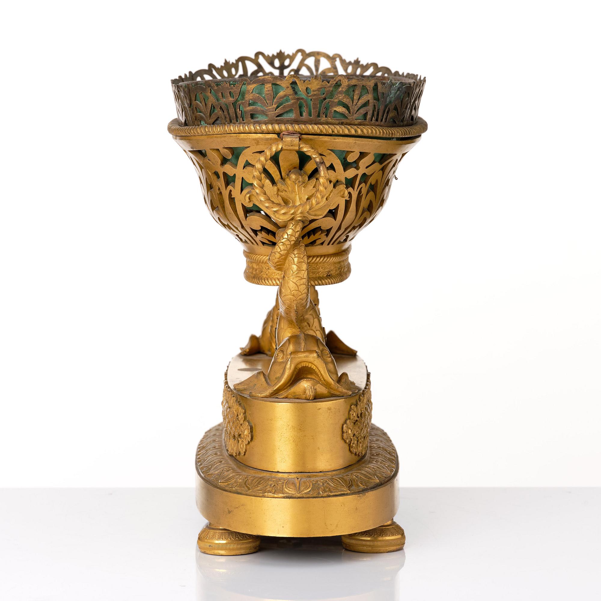 A set of three French Empire early 19th century gilt bronze centre pieces.