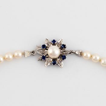 Cultured salt water pearl necklace, 18K white gold and sapphires.