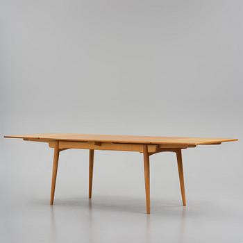 Hans J. Wegner, an "AT-312" dining table, Andreas Tuck, Denmark, 1950s-60s.