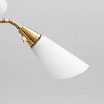 A mid 20th century floor lamp, marked AJH.7.