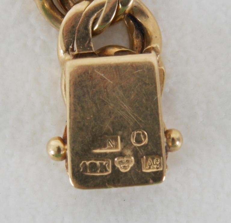 ARMLÄNK, 18K guld, ca 34 gr.