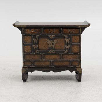 A Chinese hardwood cabinet, early 20th century.