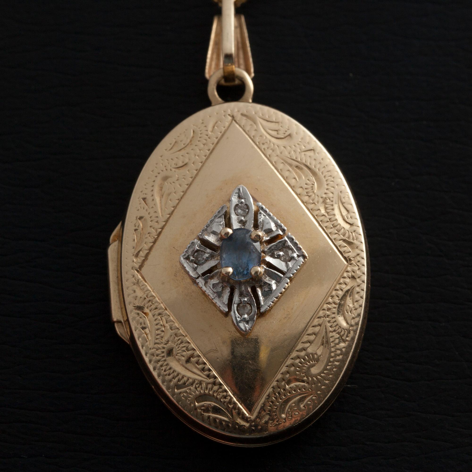 MEDALJONG/HÄNGE, 14K guld, akvamarin, 4 små diamanter. Vikt 5,8 g.