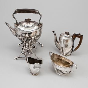 A Sheffield silver plate 5 piece tea and coffee set comprising coffee pot, tea pot, milk jug, sugar bowl, stand/burner.