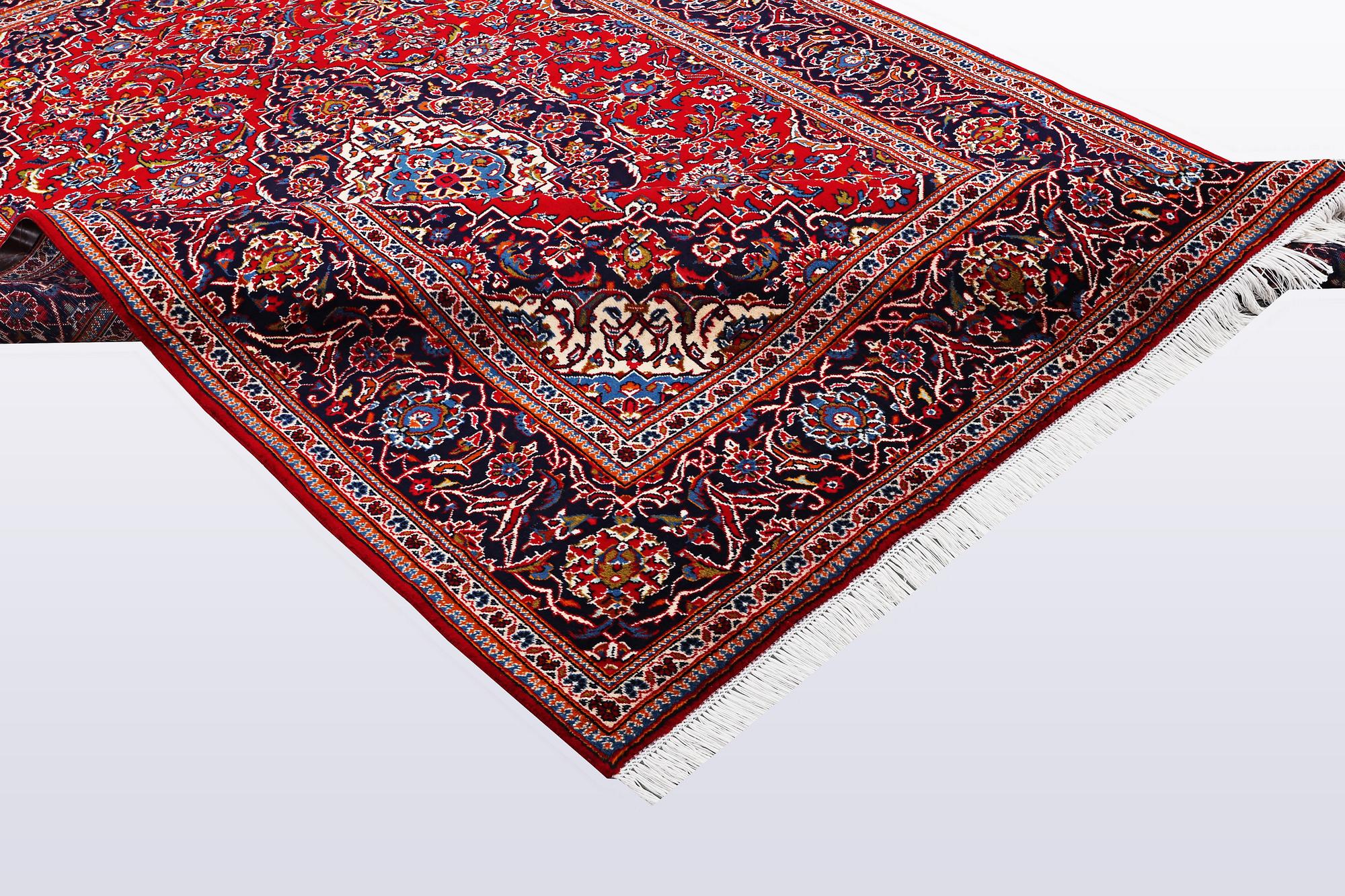 A carpet, Kashan, 308 x 202 cm.