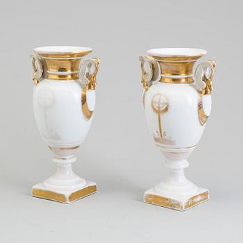 A pair of early 19th century French porcelain Empire vases.