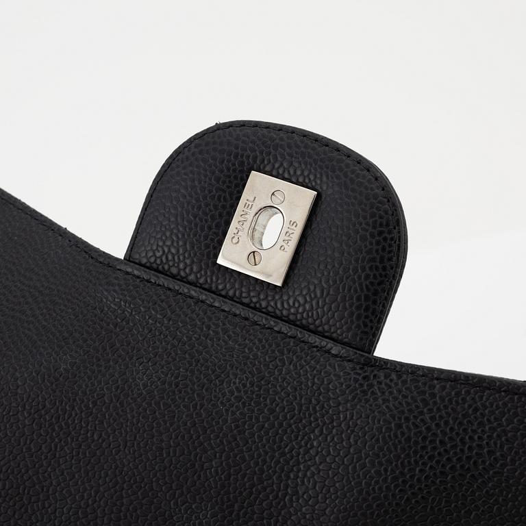 Chanel, a black caviar leather 'Double Flap Bag', 2013-14.