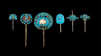 1279. A set of six Kingfisher feather and partly gilt  hair ornaments with inlays of semi precious stones, Qing dynasty.