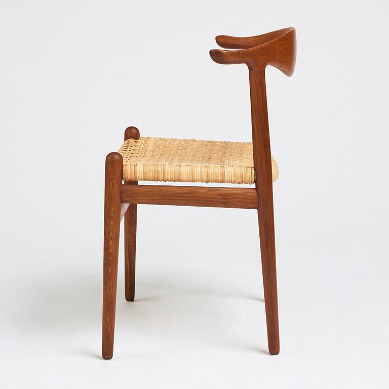 Hans J. Wegner, a teak, oak and cane "Cowhorn chair", JH 505, Johannes Hansen, Denmark 1950-60's.