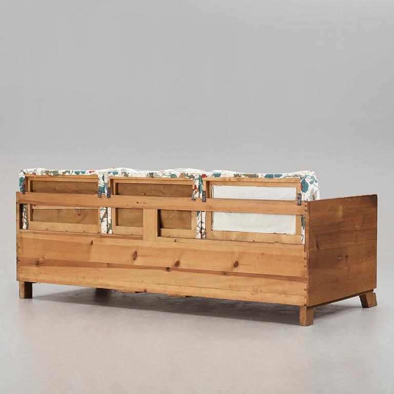 Axel Einar Hjorth, a stained pine sofa "Sport", Nordiska Kompaniet, Sweden 1930's.