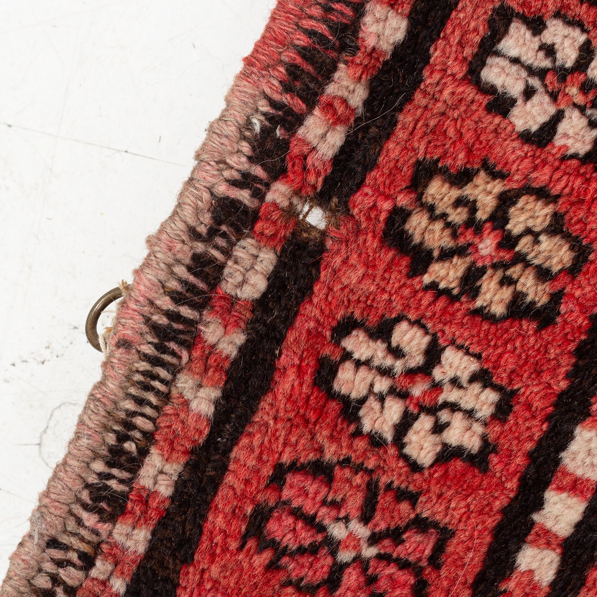 An oriental semi antique carpet, circa 272 x 120 cm.