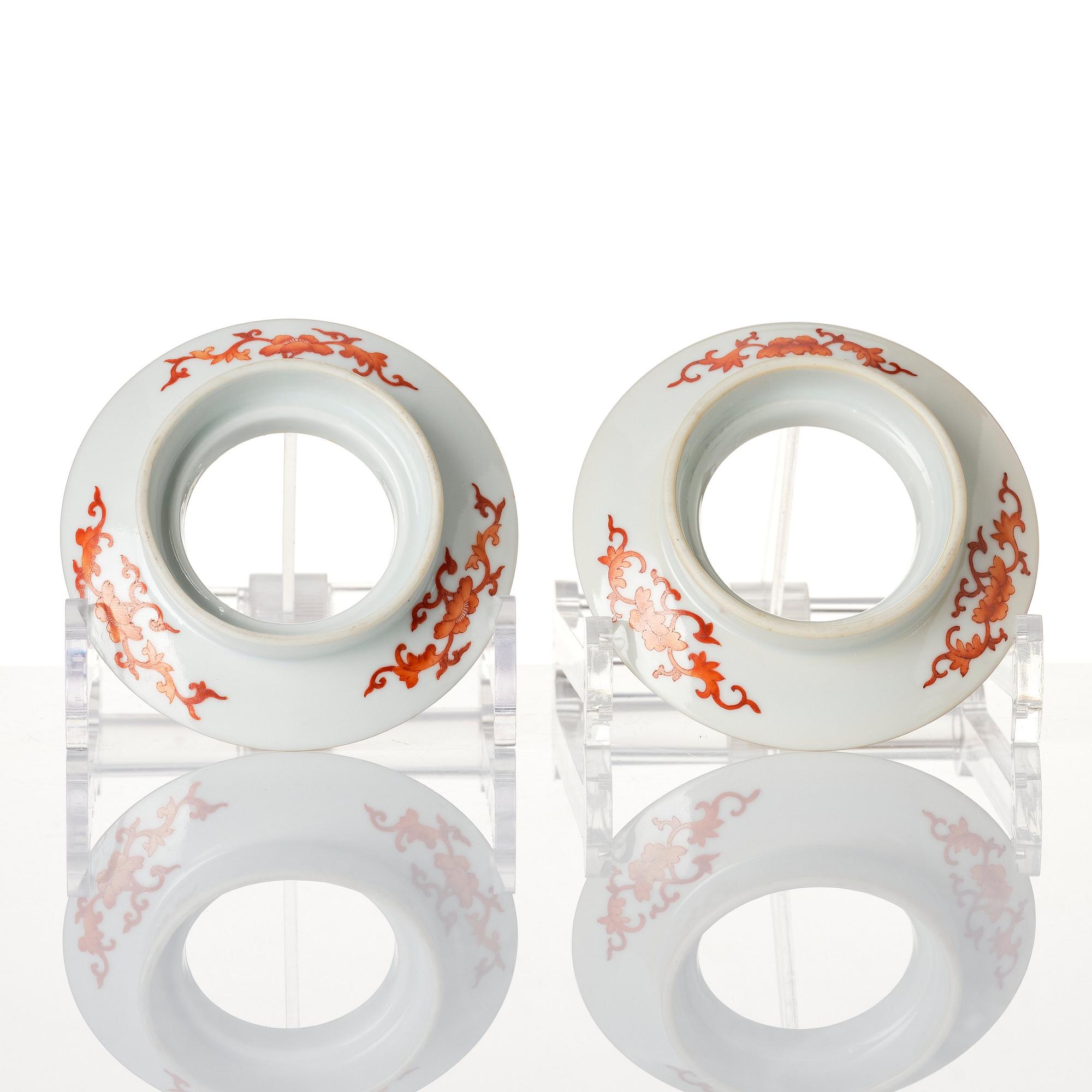 A pair of five clawed dragon bowls on stands and a cover, Qing dynasty, Daoguang mark and period (1821-50).