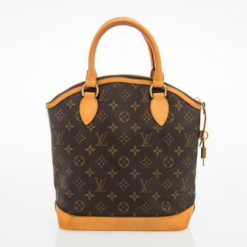 Louis Vuitton, a 'Lockit PM' bag.