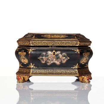 A Chinese lacquered tea caddy with pewter boxes, Qing dynasty, 19th Century.