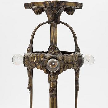 An Art Nouveau glass and brass ceiling light, Arvid Böhlmarks Lampfabrik, early 20th Century.