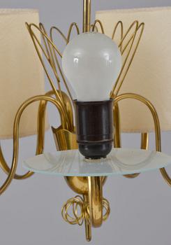 Paavo Tynell, A FIVE-LIGHT CEILING LAMP, Brass and frosted opal glass, shades in parchment imitation.