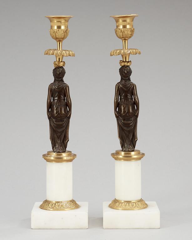 A pair of late Gustavian circa 1800 candlesticks attributed to F. L. Rung.