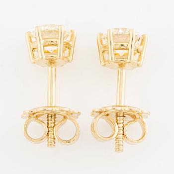 Örhängen 18K guld med briljantslipade diamanter.