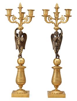 510. A pair of French Empire early 19th century three-light candelabra.