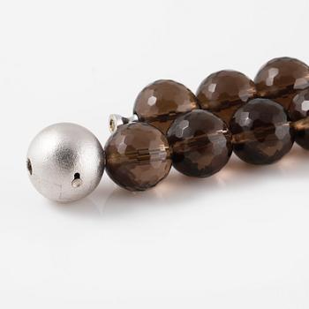 COLLIER, fasettslipad kvarts med lås i 18K vitguld, Ole Lynggaard.
