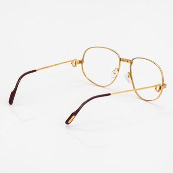 must de Cartier, Santos, a pair of eyeglass frames. Marked Cartier, Paris,  Made in France 135, 56, 16. - Bukowskis